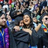 Graduates hugging